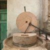 Hand-operated grain mills.